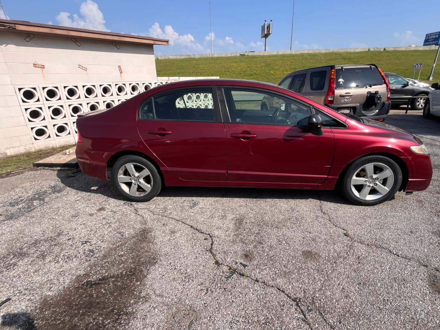 2010 MAROON HONDA CIVIC LX-S LX-S Sedan 5-Speed AT (19XFA1F60AE) with an 1.8L L4 SOHC 16V engine, 5-Speed Automatic transmission, located at 8101 E. Skelly Dr., Tulsa, OK, 74129, (918) 592-3593, 36.121891, -95.888802 - Photo#2